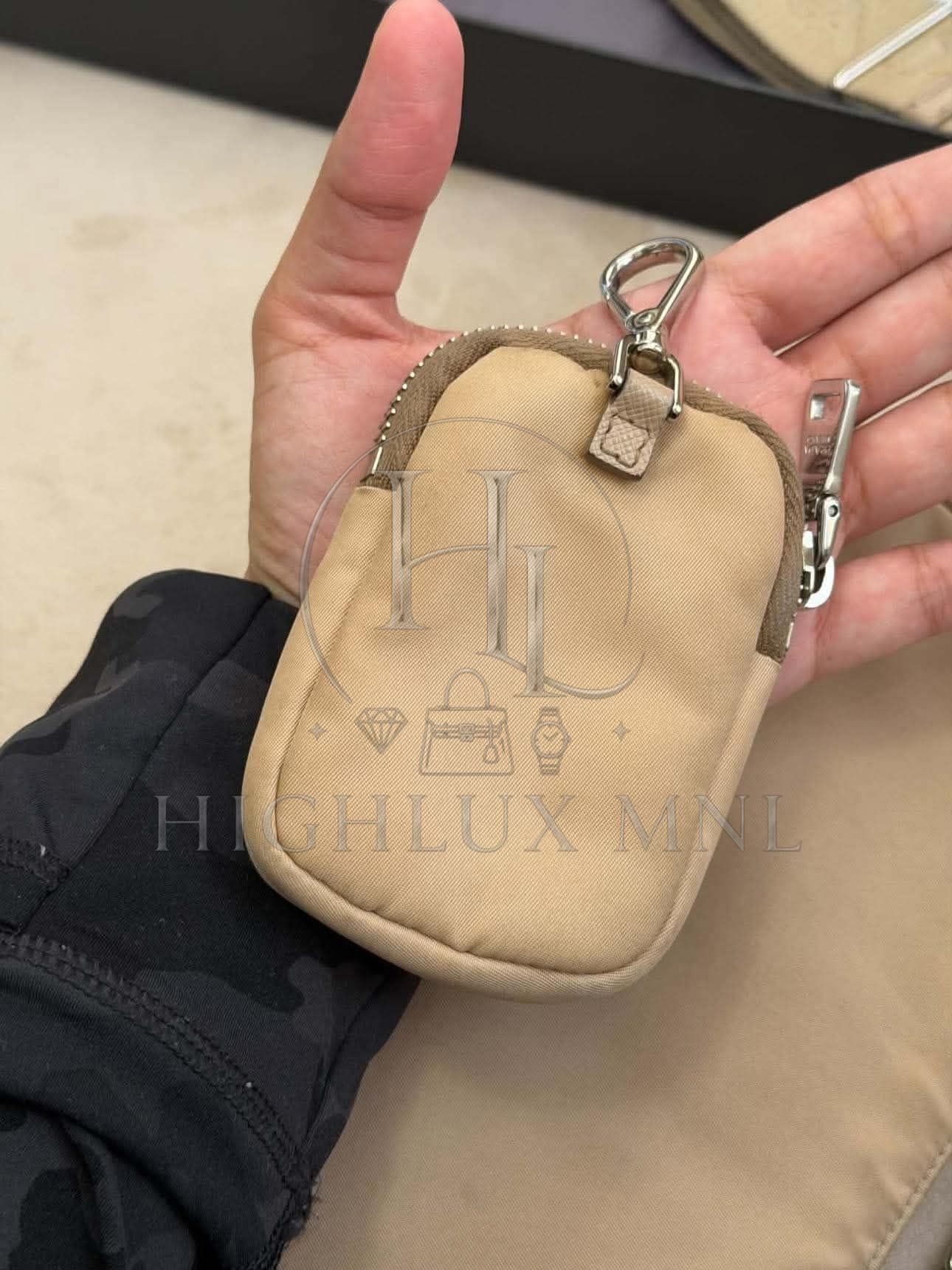 Prada Re-Edition 2005 Multipochette in Beige color — photo 5